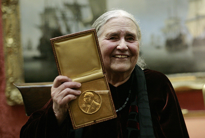 Doris Lessing obit: 2007: Doris Lessing shows her prize insignia of the Nobel Prize in Literatu
