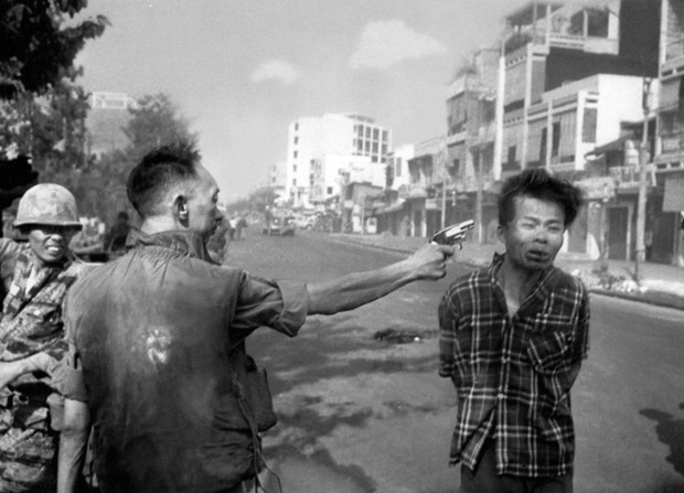 South Vietnamese National Police Chief Brig Gen. Nguyen Ngoc Loan executes a Viet Cong officer with a single pistol shot in the head in Saigon, Vietnam on Feb. 1, 1968.