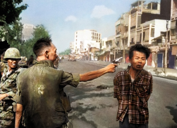 Carrying a pistol and wearing civilian clothes, the Vietcong guerrilla was captured near Quang Pagoda,