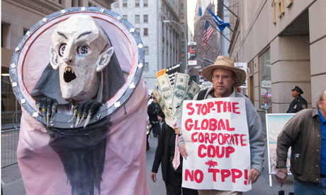 A protestor demonstrates agains the Trans-Pacific Partnership in New York City.  , From ImagesAttr