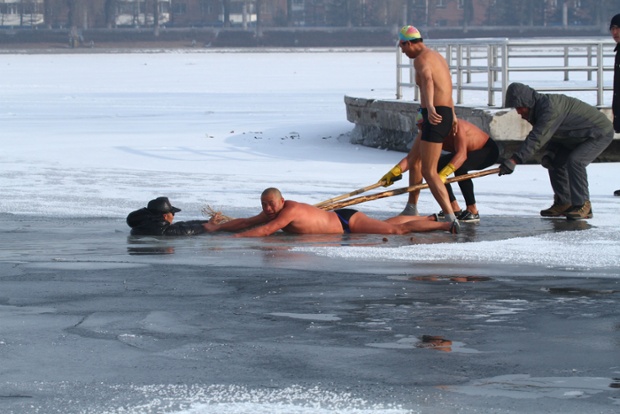 A group of winter swimmers rescues an elderly man after he fell through the ice into a frozen river in Changchun, China.
