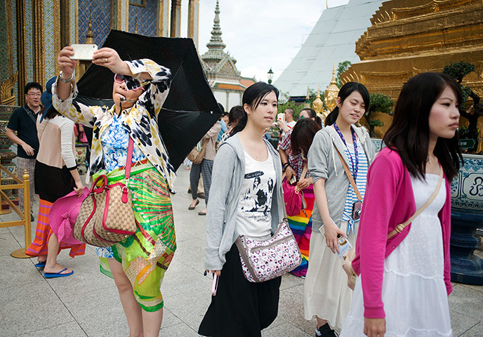 Chinese tourists: Tourists at the Grand Palace in Bangkok