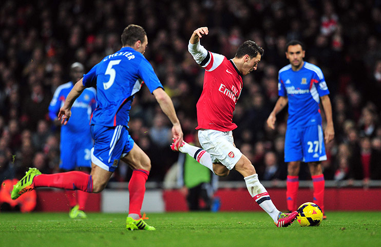 Wednesday night football: Arsenal's German midfielder Mesut Ozil scores