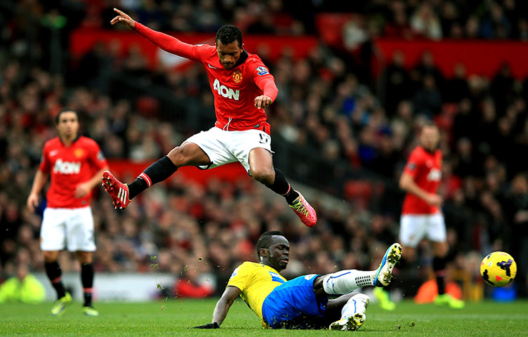 Premiership Saturday: Nani of Manchester United hurrdles the tackle from Cheik Ismael Tiote of Ne