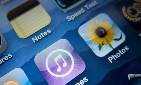 close-up of screen of iphone 4g smart phone showing itunes music