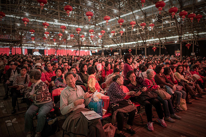 Cantonese opera: Spectators wait for the start of the show