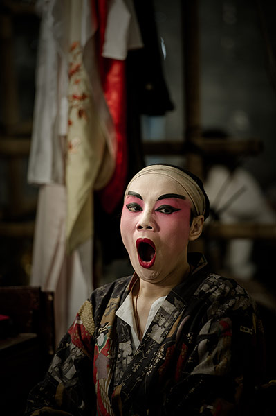 Cantonese opera: An actor yawns backstage