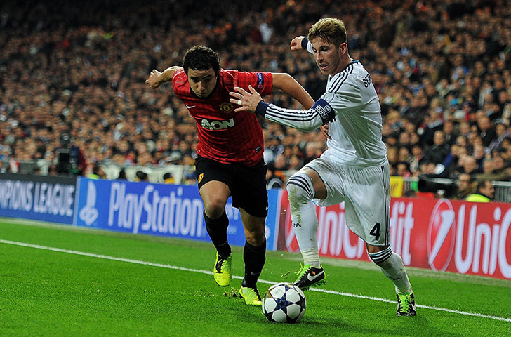 Real Madrid V United: Rafael and Sergio Ramos tussle on the touchline