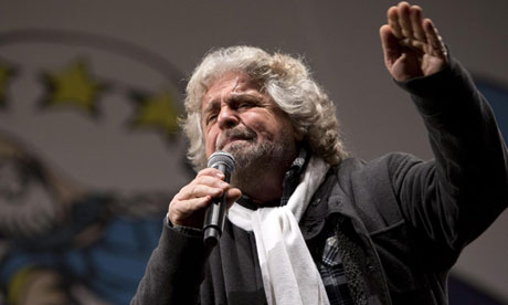 Beppe Grillo addresses supporters at a mass rally in Rome