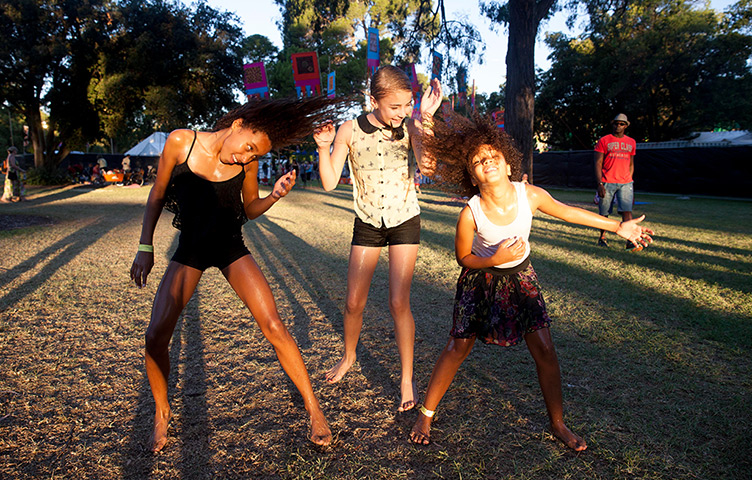Adelaide festival day 10: Naomi, Lili and Bethan enjoy a splash of water in the sunshine