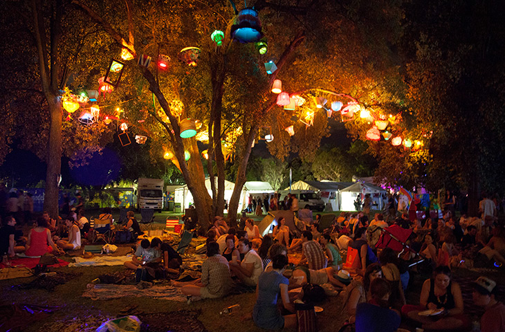 Adelaide festival day 10: Festivalgoers relax under a light installation in the trees