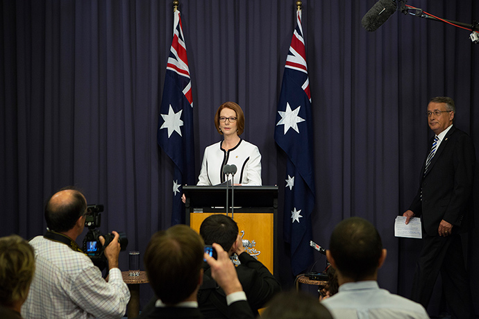 gillard: Julia Gillard arrives at the lectern to address the waiting media