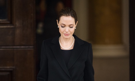 Actor and humanitarian campaigner Angelina Jolie leaves Lancaster House in central London after speaking during an announcement of funding to address conflict sexual violence on the sidelines of the G8 Foreign Ministers meeting. The G8 has pledged £10 million in funding to support efforts to tackle sexual violence in conflict and violence against women and girls.