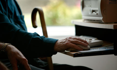 Elderly person using computer