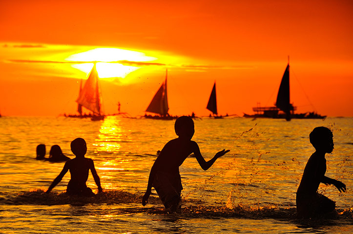 beenthereapril: Playing in the surf, Boracay island, Philippines