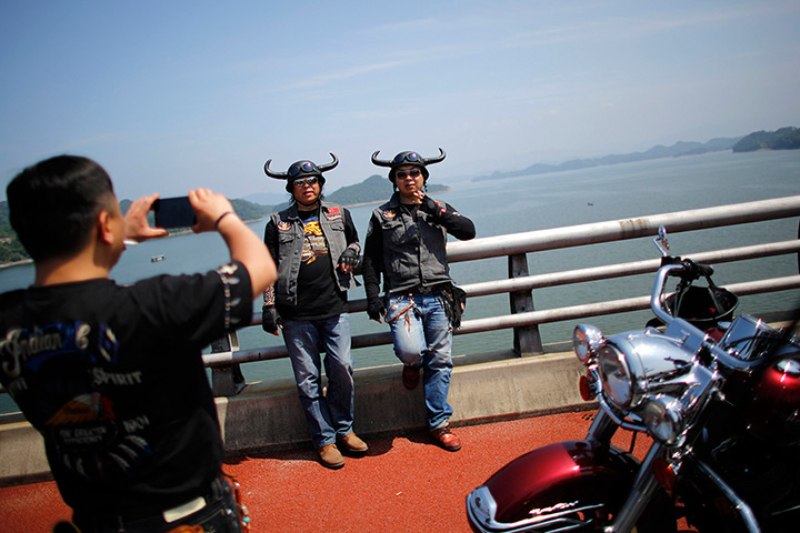 Harley rally: Riders pose for a picture during the rally at Qian Dao Lake