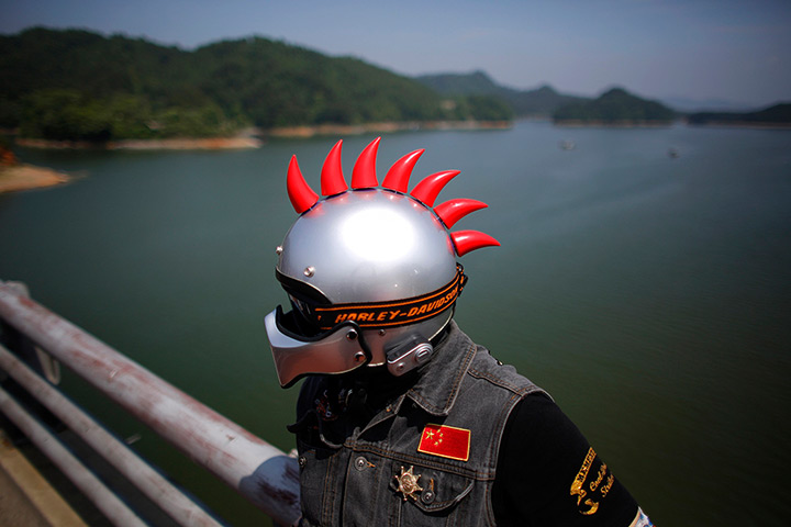 Harley rally: A rider in an elaborate helmet