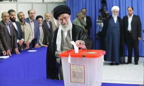 Iran's Supreme Leader Ayatollah Ali Khamenei casts his ballot at his office during the Iranian presidential election in central Tehran.