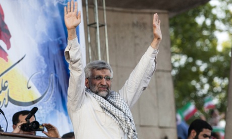 Saeed Jalili waves to his supporters during his campaign rally at Heydarnia stadium in downtown Tehran.