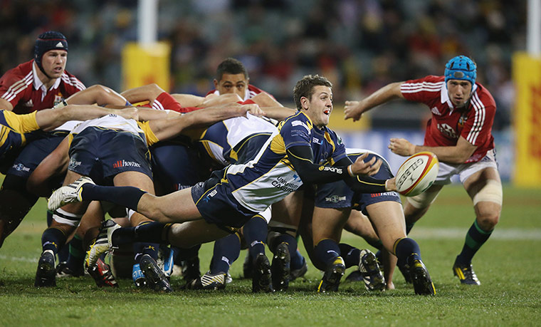 Lions: Ian Prior of the Brumbies passes the ball