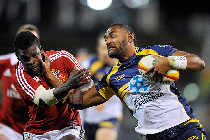 Lions: Lions' Christian Wade gets handed off by Tevita Kuridrani 