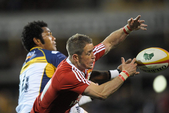 Lions: Henry Speight causes Shane Williams to spill the ball