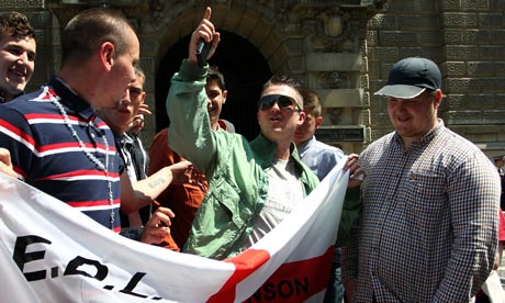 English Defence League leader, Tommy Robinson, (centre)