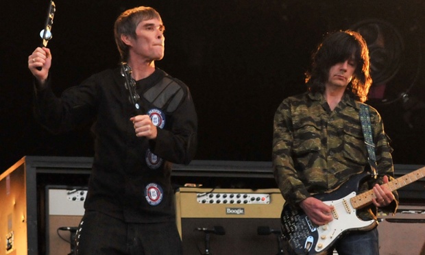 Ian Brown and John Squire of The Stone Roses perform together on stage ...