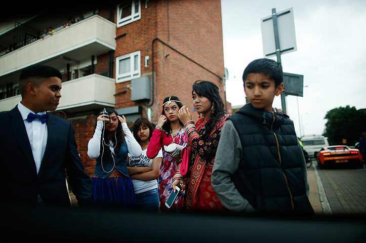 Supercar parade: Morpeth school students are seen through the window of a Ferrari