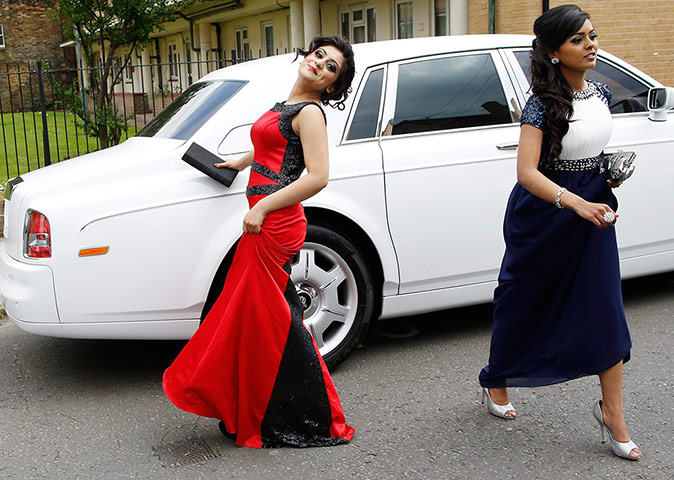 Supercar parade: Tahmina Ahmed, 16, poses in front of a Rolls Royce 