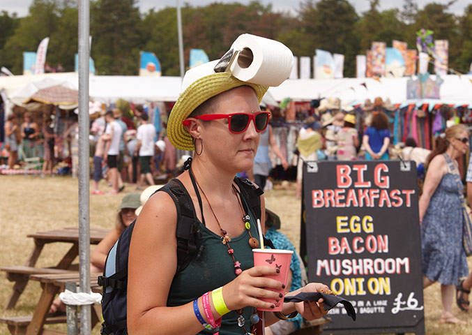 Womad: woman with loo roll at WOMAD