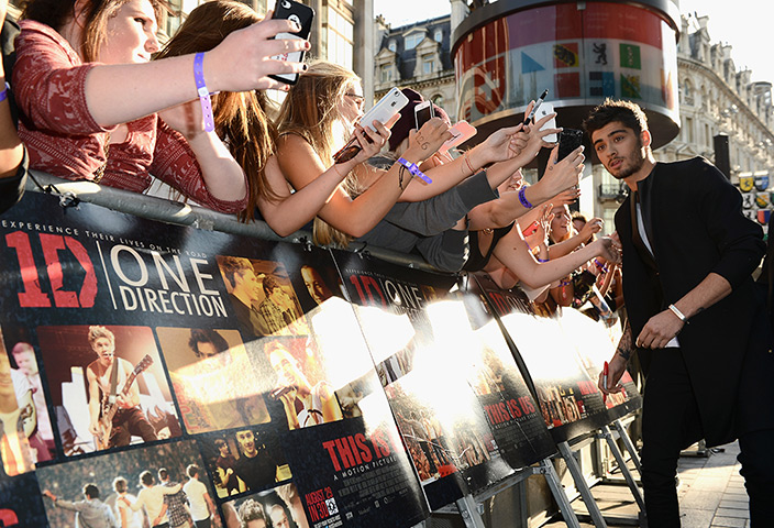 One Direction fans: Zayn Malik from One Direction poses with fans 
