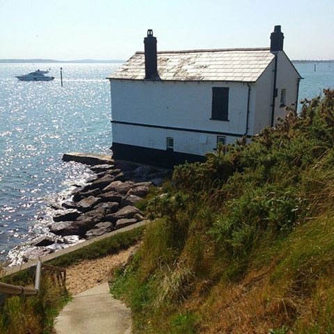 GreatSummerPhotos: Cruiser passing the old coastguard building at Lepe