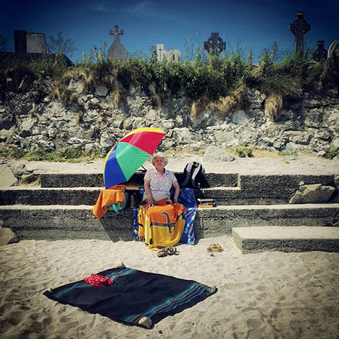 GreatSummerPhotos: Woman with umbrella on beach