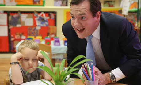 George Osborne in a nursery