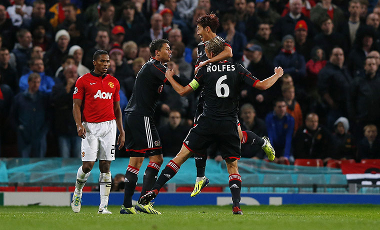 Football -: Bayer Leverkusen celebrate