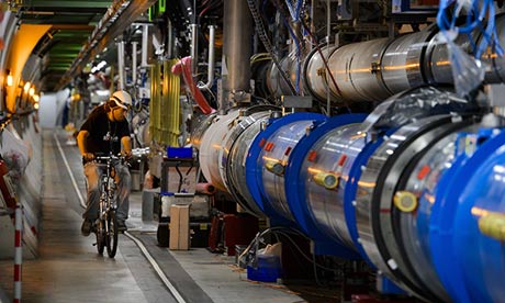 Worker on a bicycle at the Large Hadron Collider