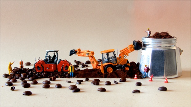 Construction workers digging coffee beans