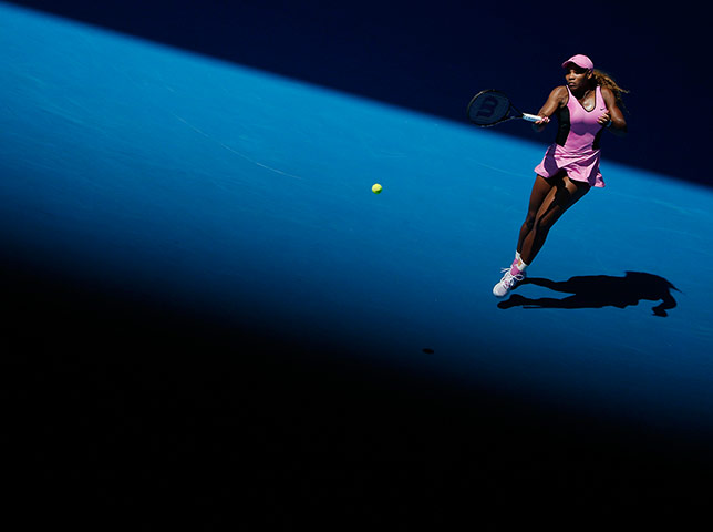 20 Photos: Serena Williams hits a return to Daniela Hantuchova at the Australian Open