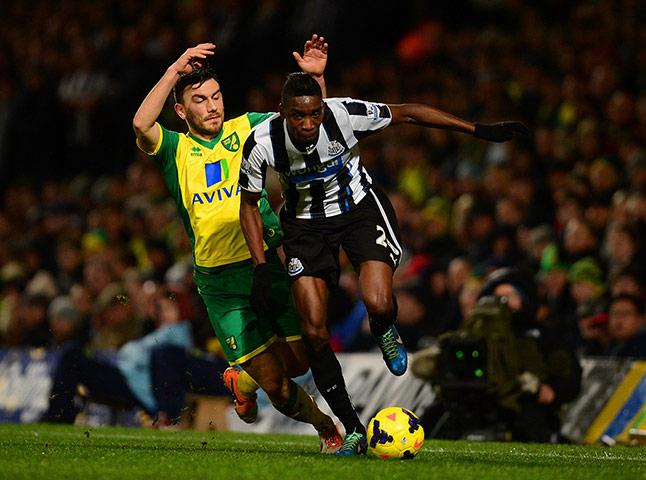 Tuesday's games: Sammy Ameobi sprints away from Robert Snodgrass 