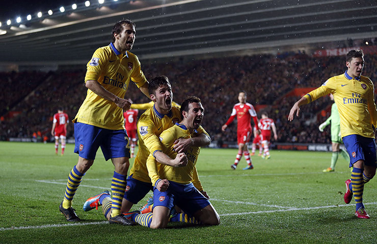 Tuesday's games: Santi Cazorla celebrates