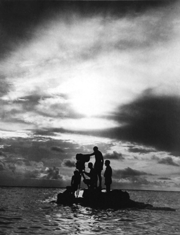 Movie cameramen standing on a rock 1948.