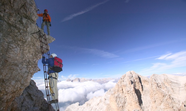 The Italian Dolomites have a huge array of nervewracking mountain routes. Dubbed the Via Ferratas, or Iron Ways, the paths were first built by troops during the first world war, but many more have been extended and upgraded since then. Here two climbers are pictured ascending a ladder on the Cristallo peak.