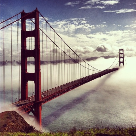 Golden Gate bridge taken from a popular tourist spot just north of the bridge on a rare day of low-rolling fog (iPhone 4)