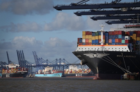 Container ships are unloaded at Felixstowe port on October 17, 2013 in Felixstowe, England.