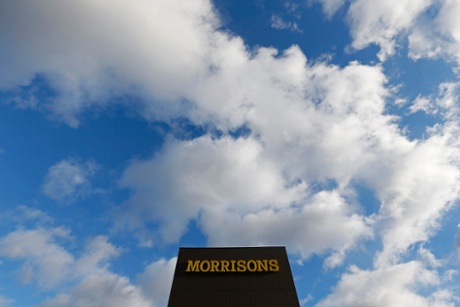 A Morrisons sign is seen outside a supermarket in London January 9, 2014.