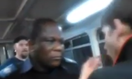 Man's racist attack on Brisbane train caught on video