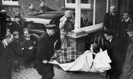 4 January 1940: Unity Valkyrie Mitford being carried on a stretcher from a hotel at Folkestone to a waiting ambulance.