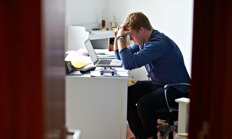 stressed man at desk