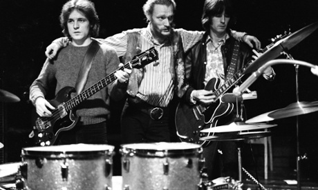 Bruce, left, with Ginger Baker, centre, and Eric Clapton at their farewell performance at the Royal Albert Hall, London, in November 1968.